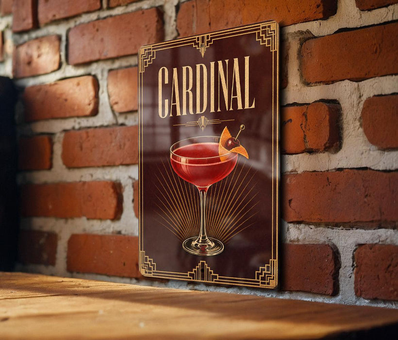 A decorative sign with the word "CARDINAL" prominently displayed, featuring an illustration of a martini glass with a cherry on top.