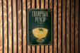 A poster with the title "CHAMPAGNE PUNCH" displayed prominently, featuring an illustration of a champagne punch bowl with a garnish.