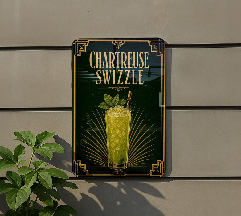 A decorative sign for a Chartreuse Swizzler cocktail, featuring a glass of the drink and a mint leaf garnish.
