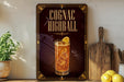 a decorative sign advertising a Cognac Highball cocktail, with a glass of the cocktail prominently displayed.