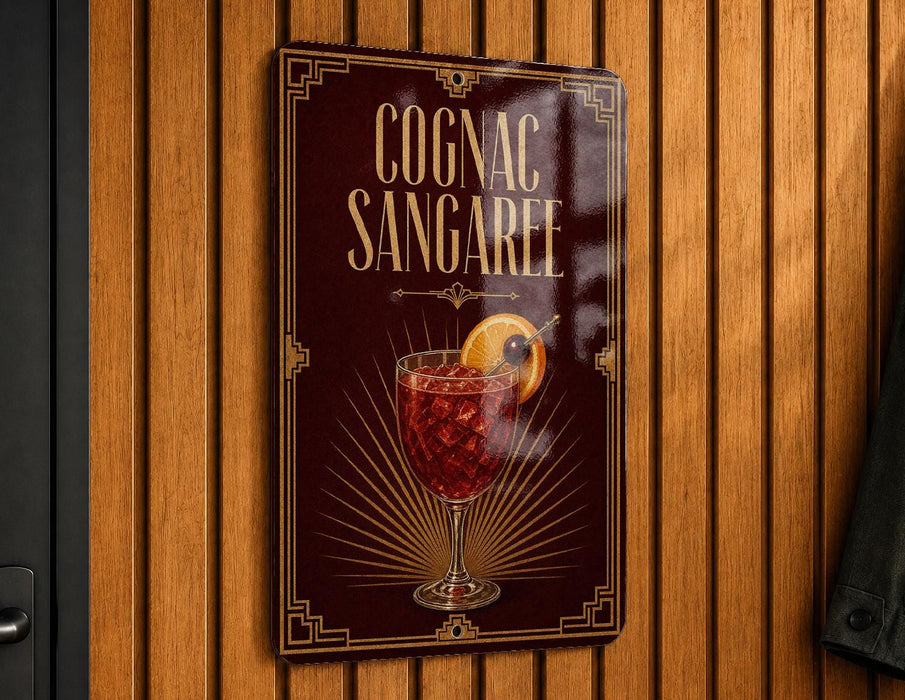 A sign for a Cognac Sangaree cocktail is displayed on a wooden wall.