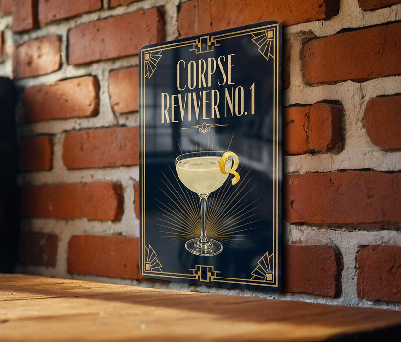 a sign with a cocktail glass and a lemon twist, mounted on a brick wall.
