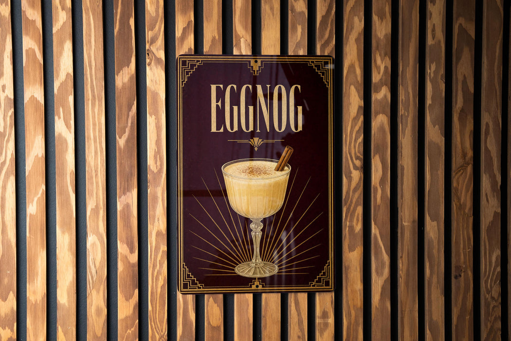 A poster advertising "Eggnog" cocktail is displayed on a wooden wall.