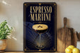 A framed poster advertising espresso martini, featuring an illustration of a martini glass with a frothy head and a lemon slice.