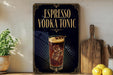 a poster advertising an espresso vodka tonic cocktail, with a glass of the cocktail and ice cubes displayed prominently.