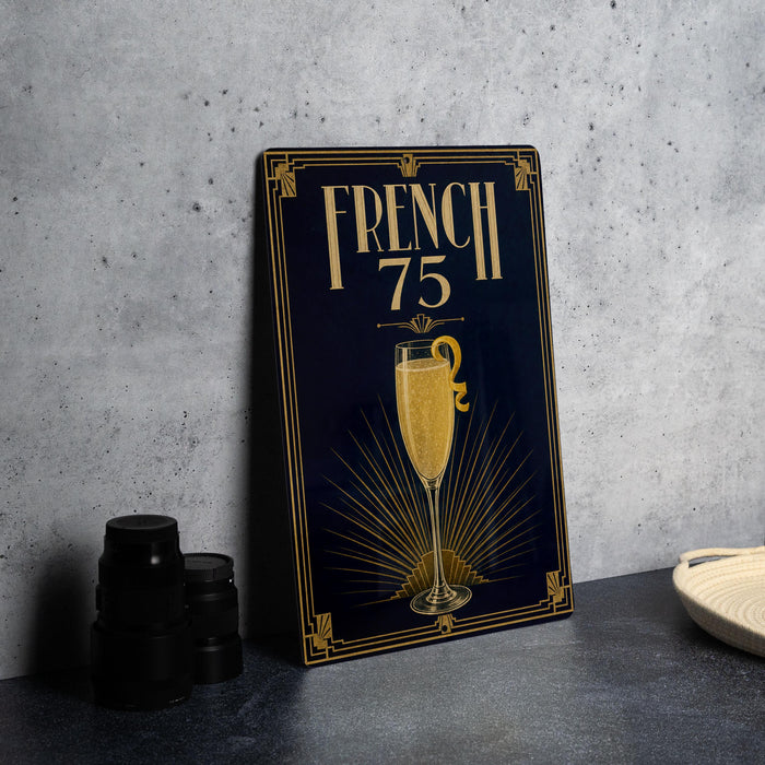a decorative sign with the text "FRENCH 75" and an illustration of a champagne glass.