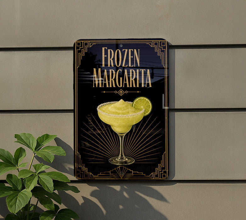 A sign for a frozen margarita is displayed on a wall, featuring a picture of a margarita glass with a lime slice.