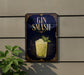 A sign with the text "GIN SMASH" and an illustration of a cocktail on a dark background.