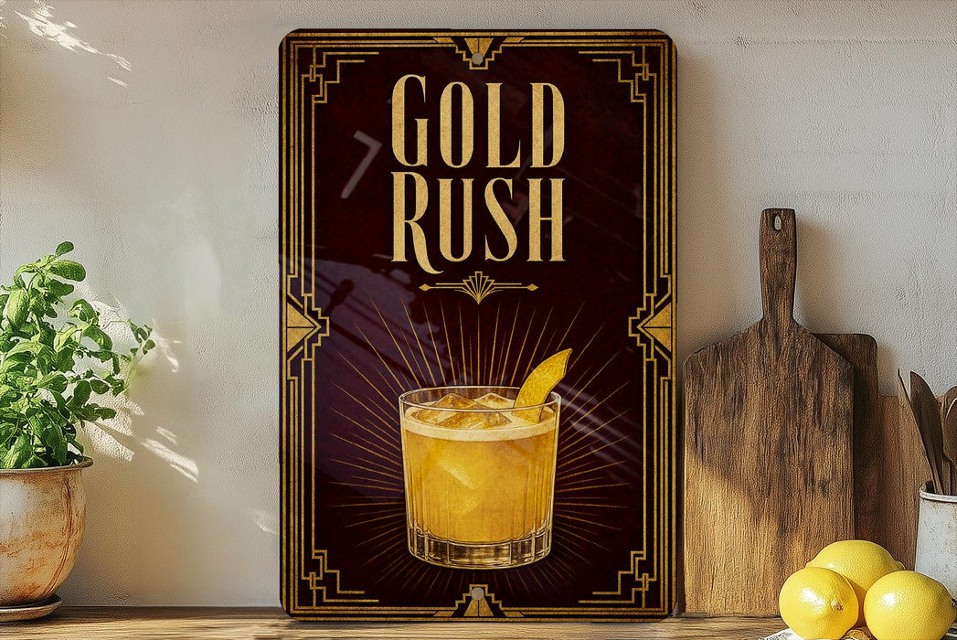 A framed advertisement for a cocktail called "Gold Rush" is displayed on a wall, featuring an illustration of a cocktail glass with a lemon slice.