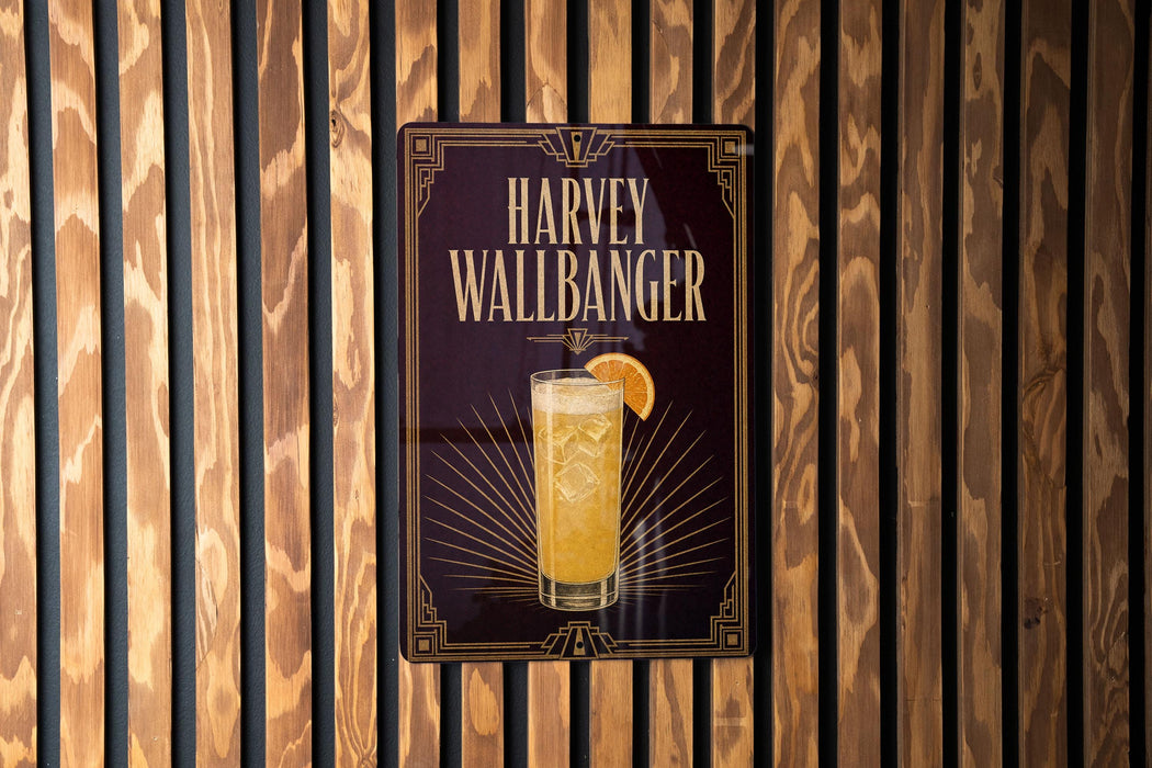 A sign for "Harvey Wallbanger" cocktail, featuring an illustration of a glass with a slice of orange on the front.
