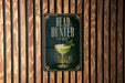 A sign that reads "HEAD HUNTER" is displayed on a wooden wall.