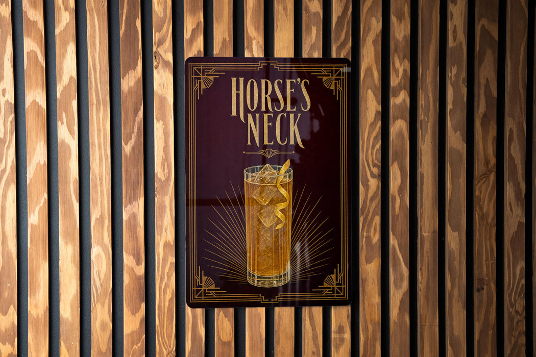 A sign for "Horses Neck" cocktail is displayed on a wooden wall.