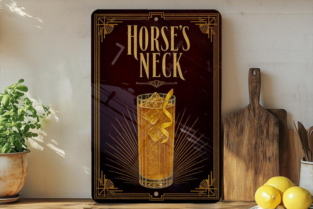 a decorative sign with the text "HORSE'S NECK" and an illustration of a glass of amber-colored liquid, possibly a cocktail or a mixed drink. The sign is displayed on a wooden surface, with a potted plant, a wooden cutting board, and some lemons nearby.