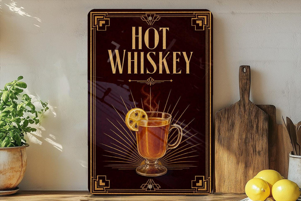 A decorative sign with the text "HOT WHISKEY" and an illustration of a hot whiskey drink with a lemon slice.