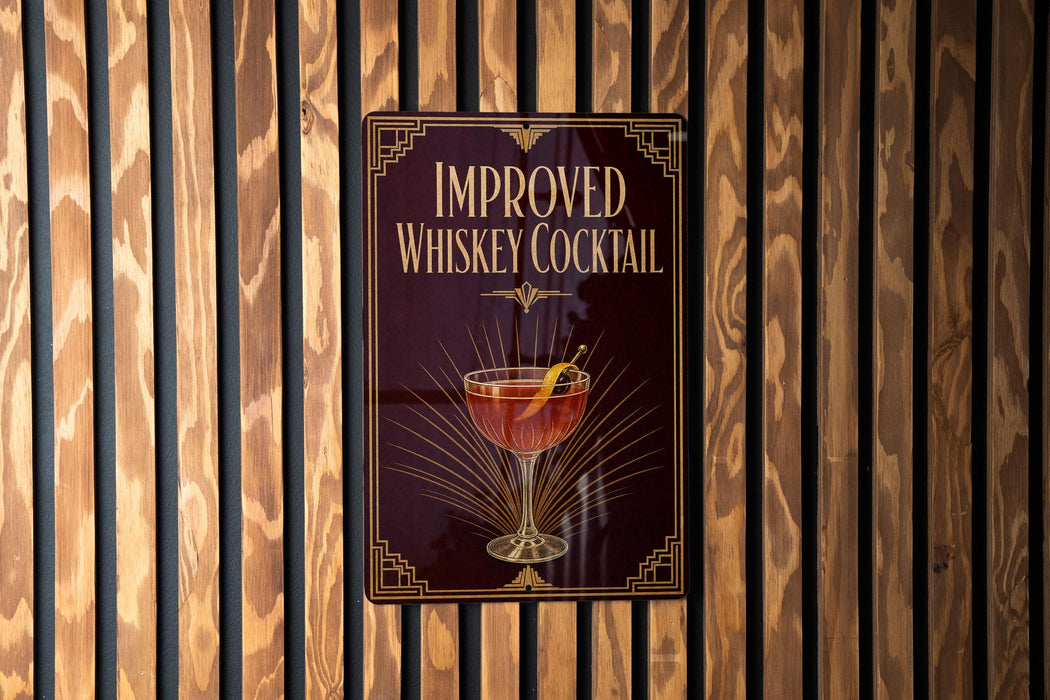 a sign that reads "IMPROVED WHISKEY COCKTAIL" with an illustration of a cocktail on the sign.