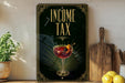 a sign with the text "INCOME TAX" and an illustration of a martini glass with an orange twist.