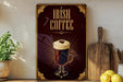 a sign advertising Irish coffee, with a glass of Irish coffee prominently displayed in the center.