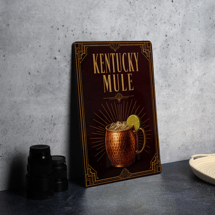 A framed advertisement for a Kentucky Mule cocktail, featuring an illustration of a copper mug with ice and a lemon slice.