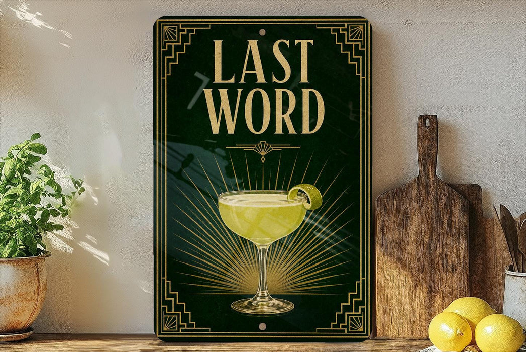a decorative sign with the text "LAST WORD" and an illustration of a cocktail glass with a lime on a wooden surface.