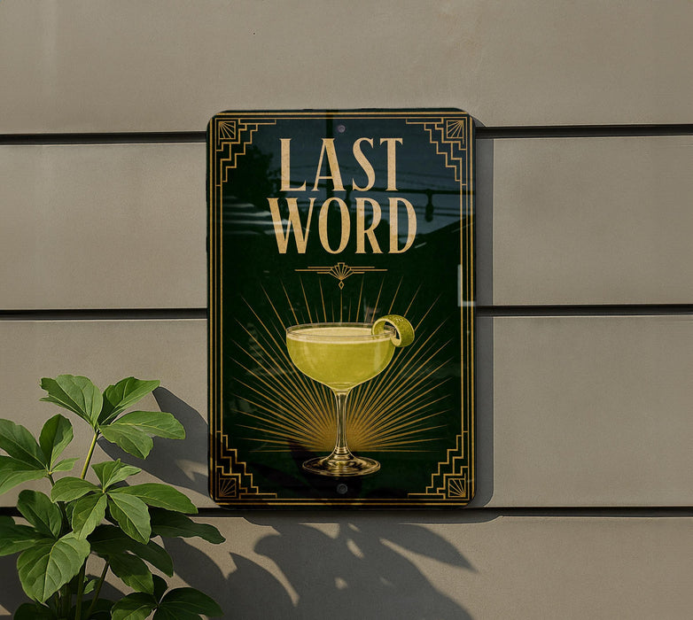 a sign with the text "LAST WORD" and an illustration of a cocktail glass with a lime wedge.