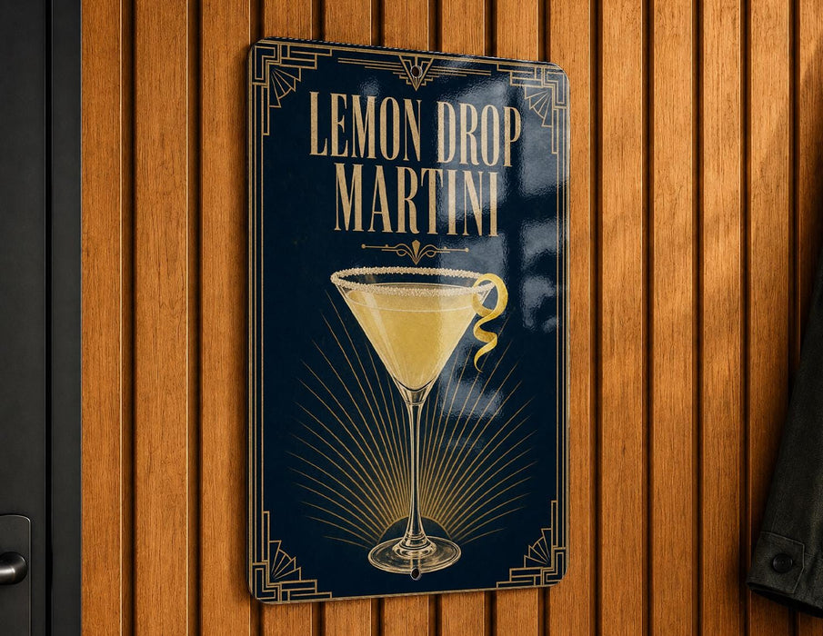 A sign for a lemon drop martini, featuring an illustration of a martini glass with a lemon twist.