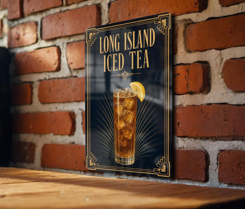 A framed advertisement for Long Island Iced Tea hanging on a brick wall.