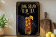 A framed advertisement for Long Island Iced Tea, featuring an illustration of a tall glass filled with iced tea and a lemon slice.