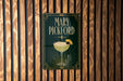 A sign for "Mary Pickford" cocktail is displayed on a wooden wall.