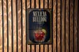 A sign for "Mexican Bulldog" cocktail, featuring an illustration of a glass with a red drink and a lime wedge.