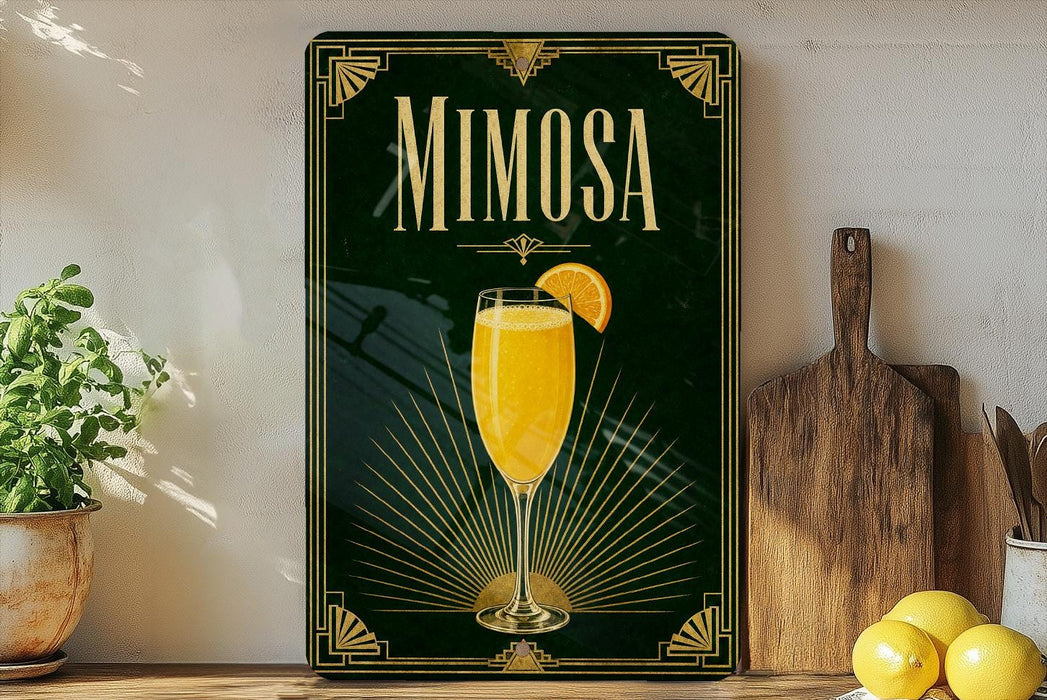 A framed poster of a mimosa cocktail is displayed on a wall, with a wooden cutting board and a potted plant to the side.