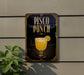 A sign for "Pisco Punch" is displayed on a wall, featuring an illustration of a glass of pisco punch with a lemon slice.