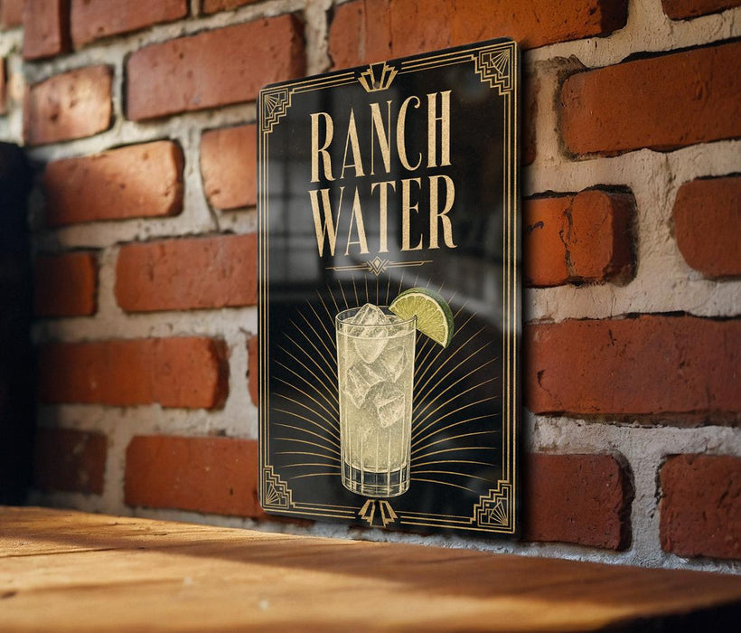 A sign for Ranch Water is displayed on a brick wall, featuring an illustration of a glass of water with a lime slice.
