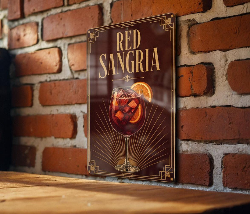 A sign for "Red Sangria" is displayed on a brick wall, featuring an illustration of a glass of red wine with a slice of orange.