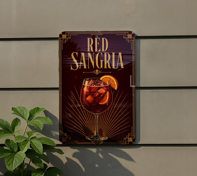 a sign for "Red Sangria" hanging on a wall, with a glass of red wine and orange slices displayed on the sign.
