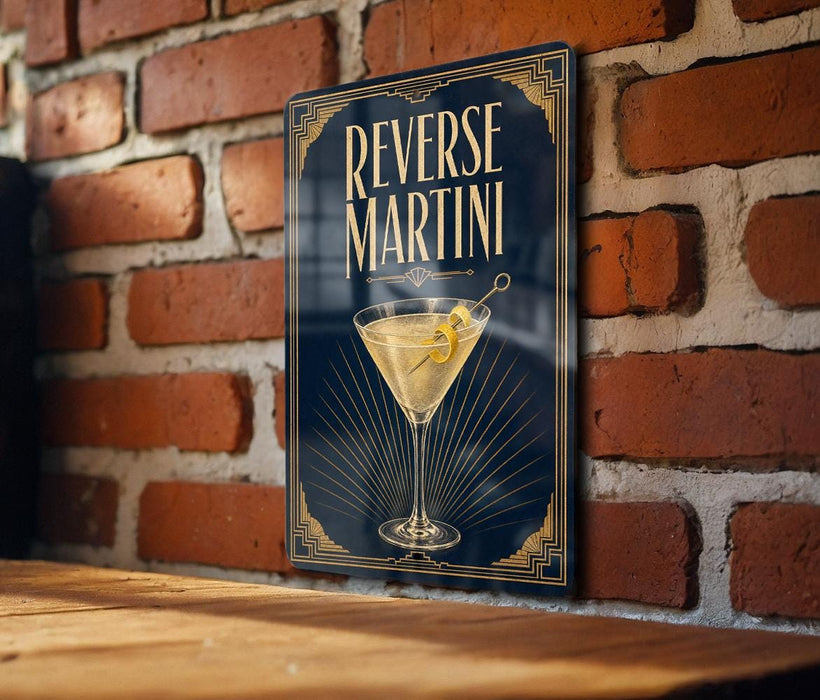 A poster or sign with the text "REVERSE MARTINI" and an illustration of a martini glass with a lemon twist.