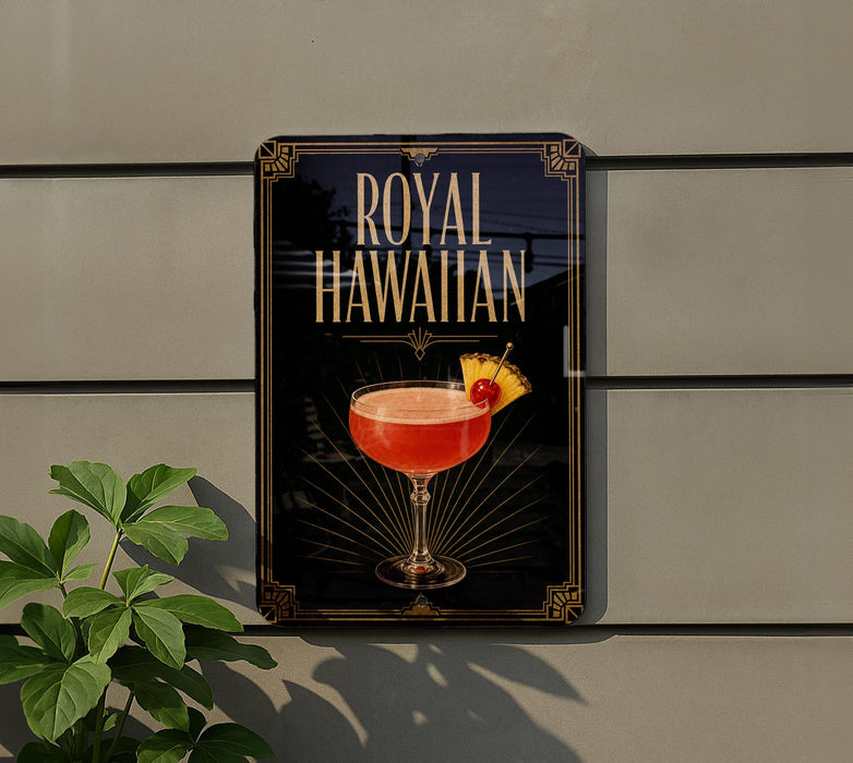 A sign for a "Royal Hawaiian" cocktail, featuring a glass of the drink with a pineapple garnish.