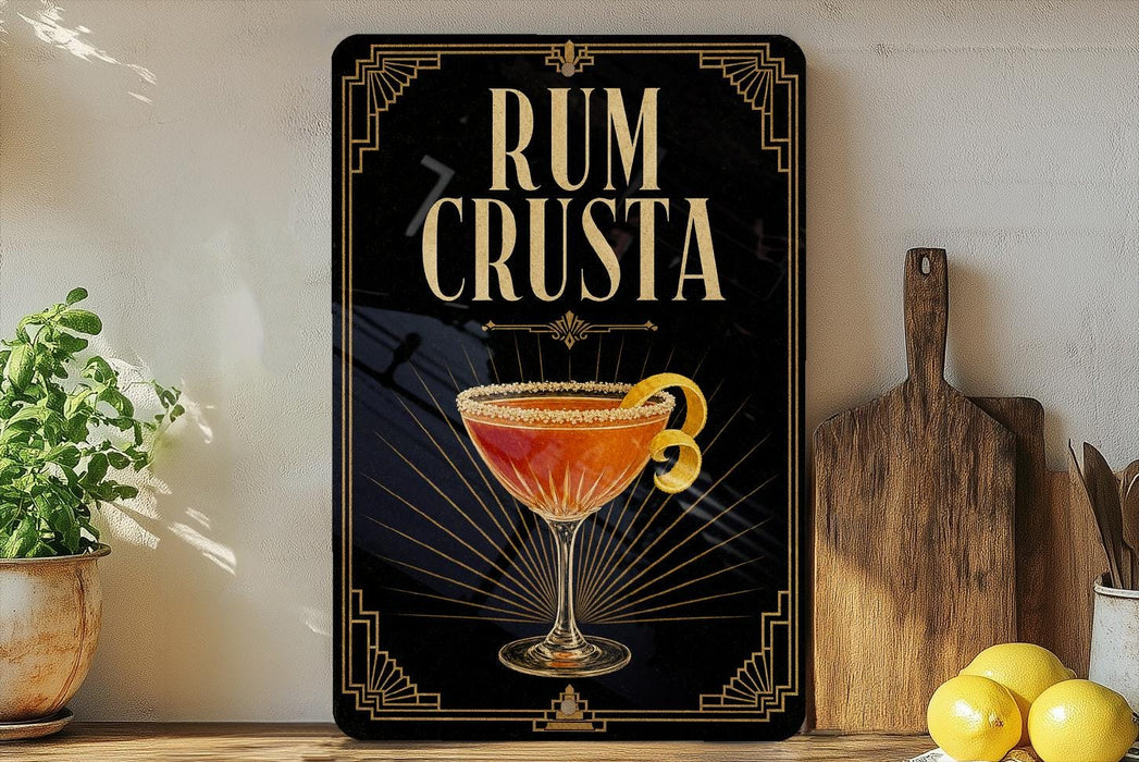 a decorative sign with the text "RUM CRUSTA" and an illustration of a cocktail glass with a lemon twist.