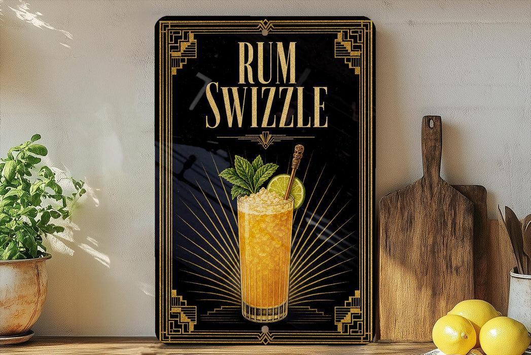 A framed advertisement for a rum swzzle cocktail, featuring an illustration of a tall glass filled with a yellow drink and garnished with a lemon slice and mint leaves.