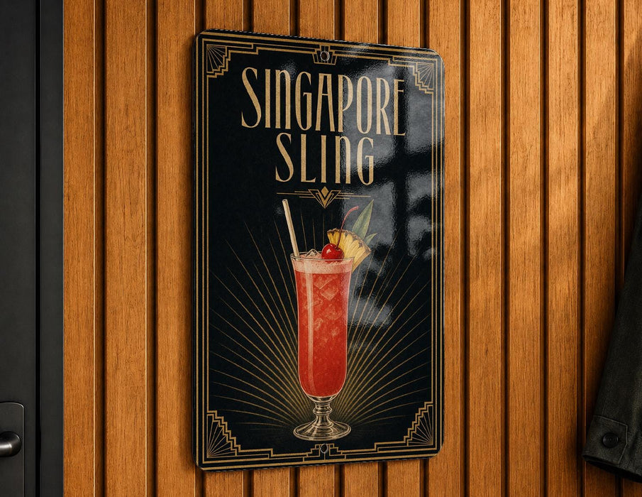 A sign for "Singapore Slinger" cocktail, featuring an illustration of a cocktail glass with a red drink, garnish, and straw.