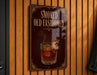A sign that reads "Smoked Old Fashioned" with an illustration of a glass of whiskey.