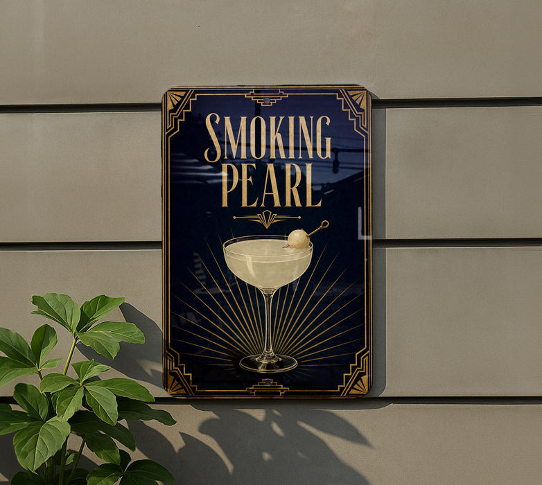 a sign that reads "Smoking Pearl" with a glass of white liquid and a garnish on it.