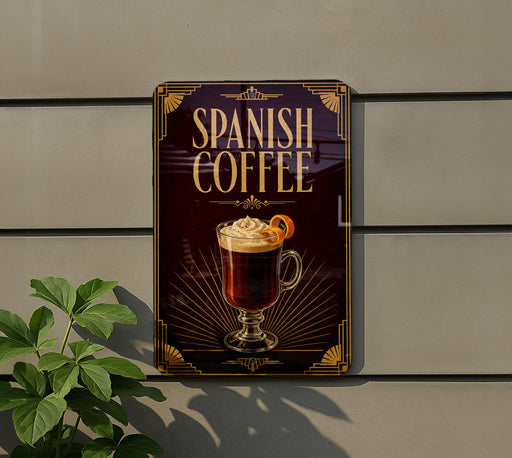 A sign for Spanish coffee is displayed on a wall, featuring an illustration of a coffee drink with whipped cream and a slice of orange.