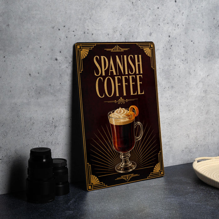 A decorative sign for Spanish coffee, featuring an illustration of a hot beverage with whipped cream and an orange slice.