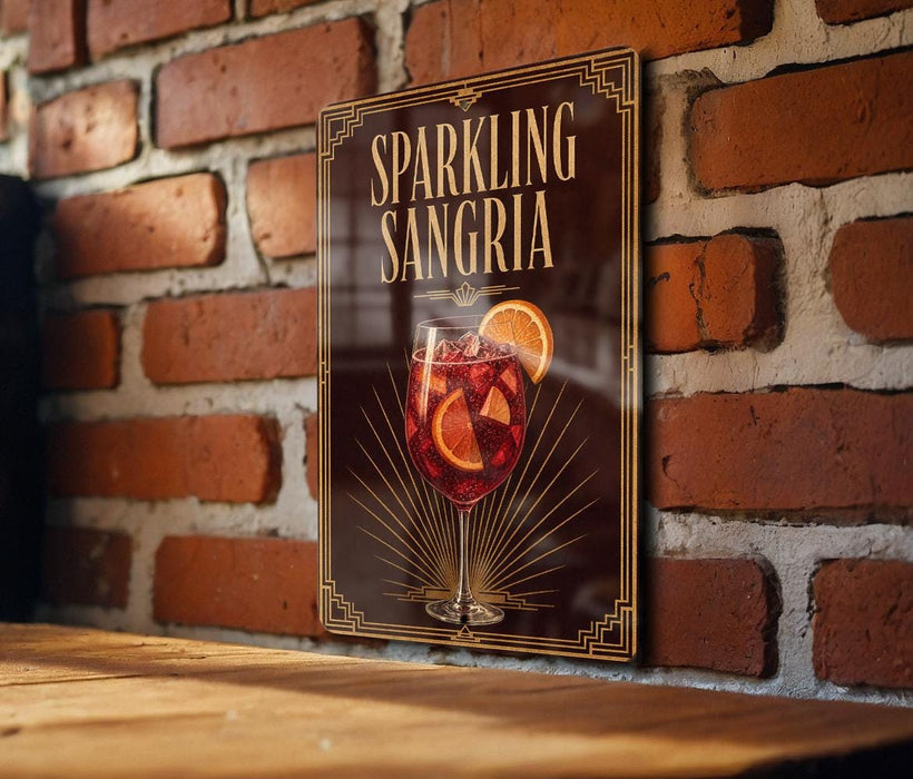 A sign for "Sparkling Sangria" is displayed on a brick wall, featuring an illustration of a glass filled with a red drink and a slice of orange.