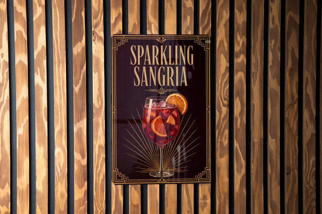 A poster advertising "Sparkling Sangria" is displayed on a wooden wall.