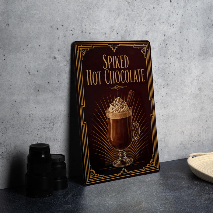 A framed advertisement for "Spiked Hot Chocolate" is displayed on a wall, featuring an illustration of a hot chocolate drink with whipped cream.