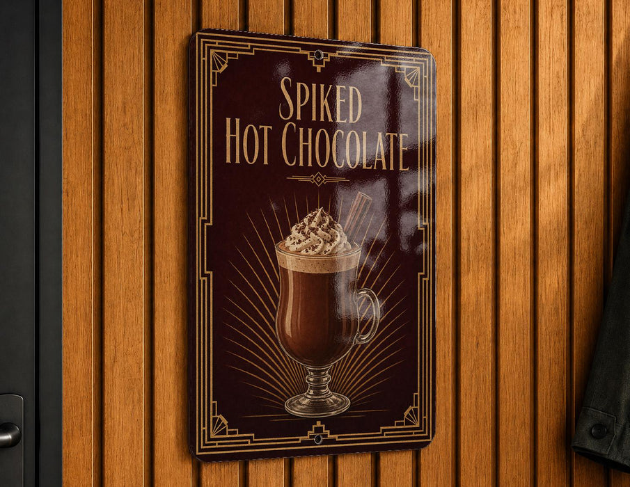 A sign advertising "Spiked Hot Chocolate" is displayed on a wooden wall.