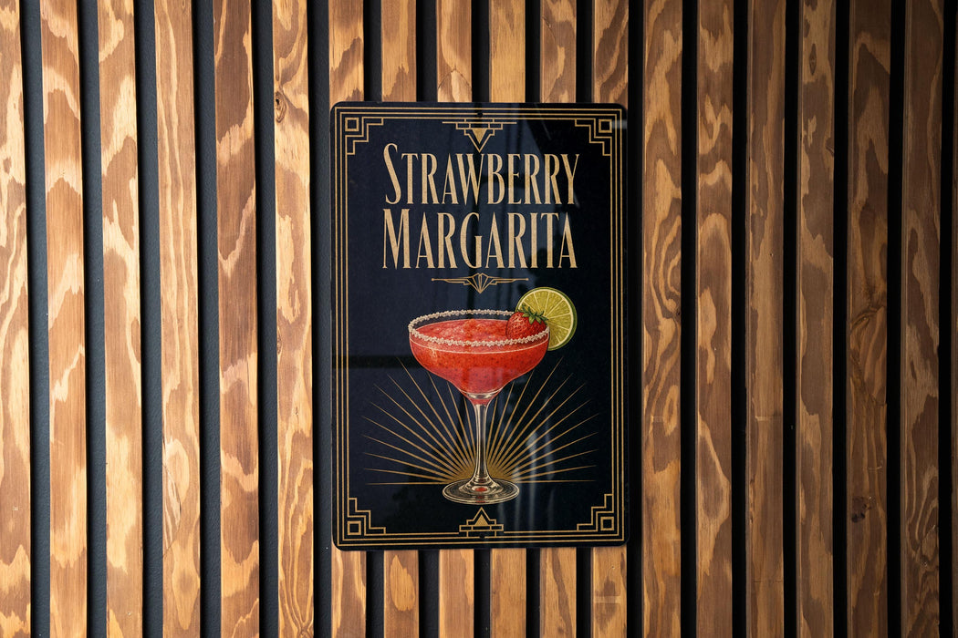 A sign for a strawberry margarita is displayed on a wooden wall.