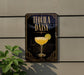 A sign for "Tequila Daisy" cocktail is displayed on a wall, featuring an illustration of a tequila glass with a lime slice.