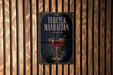 A sign for "Tequila Manhattan" is displayed on a wooden wall.
